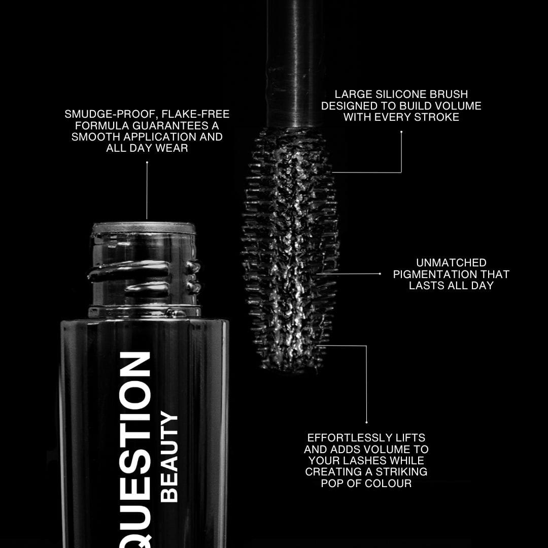 A tube of mascara with a large brush and dark pigment is shown against a plain background.
