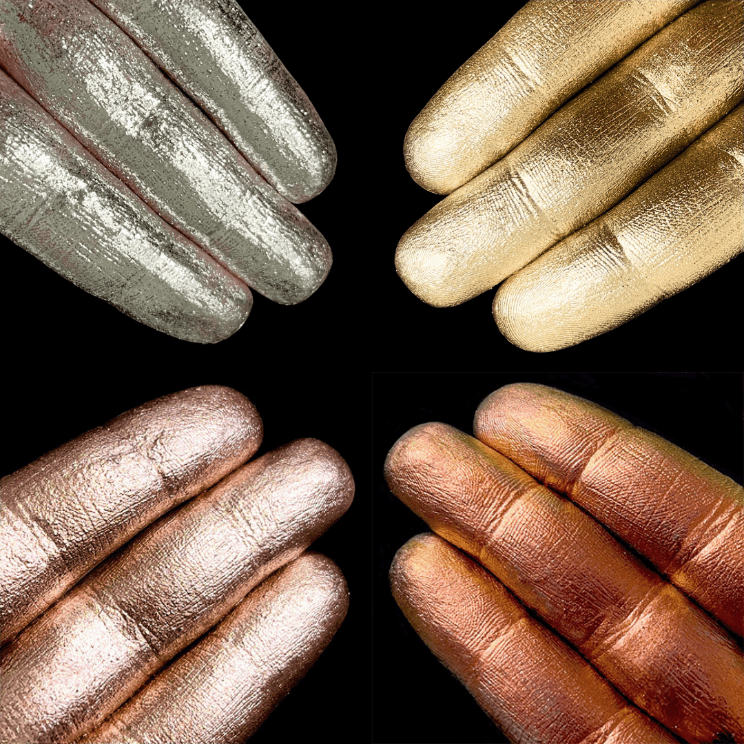 Four hands painted silver, gold, bronze, and copper are shown against a black background.