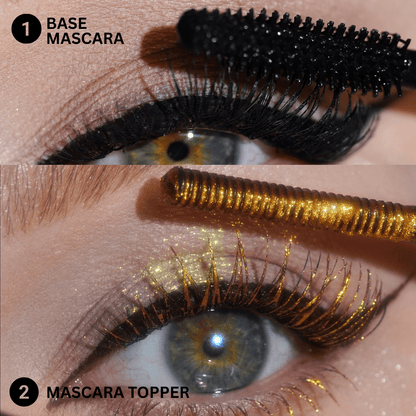 Close-up of eyes with black mascara and a visible golden topper applied to lashes.