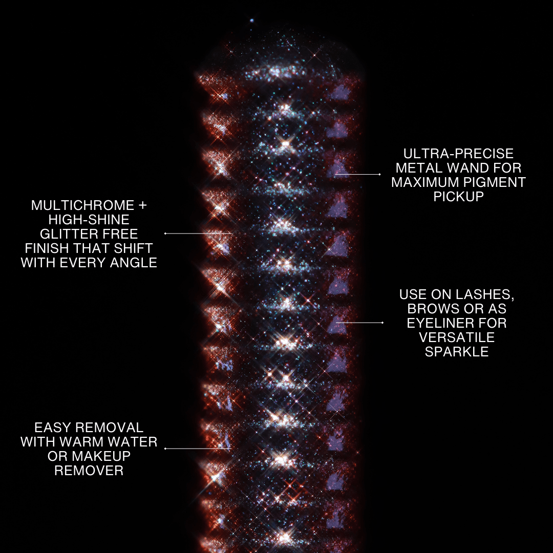 A mascara brush coated in metallic multichrome glitter against a black background.