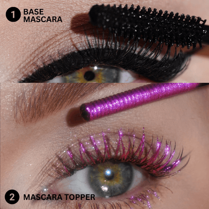 Close-up showing two eyes; the top has black mascara and the bottom has magenta mascara labeled Mascara Topper.