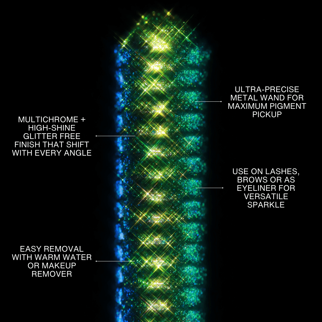 A close-up of a multichrome glitter mascara wand showing blue and green colors against a black background.