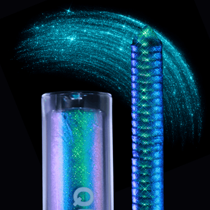 Blue green sparkling mascara swatches on a black background