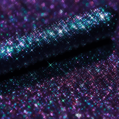 Close-up of a mascara topper with visible purple, blue, and green shimmer.