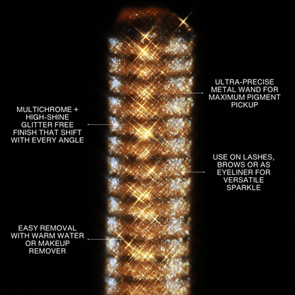 Close-up of a Sunlit Treasure mascara topper wand with multicolor glitter and visible labeled features.